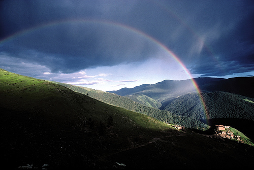 A double rainbow appears over Palpung Monastery as Dilgo Khyentse Rinpoche approaches